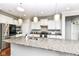 Well-equipped kitchen features stainless steel appliances and a functional island at 13427 Merryvale St, Fishers, IN 46037