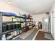 Well-organized storage area featuring shelving units, storage bins, and easy access at 13427 Merryvale St, Fishers, IN 46037