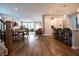 Spacious open-concept living and dining area with wood floors and modern decor at 14404 Stairbridge Pl, Carmel, IN 46074