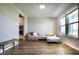 Comfortable living room featuring a cozy sofa, natural light, and stylish decor at 14404 Stairbridge Pl, Carmel, IN 46074