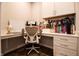 Cozy office featuring a built-in desk, ample storage, and natural light at 14404 Stairbridge Pl, Carmel, IN 46074
