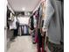 Spacious walk-in closet offering ample storage with shelving and hanging rods at 14404 Stairbridge Pl, Carmel, IN 46074