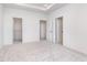 A main bedroom features carpeted floors, multiple closets and multiple doors to adjoining spaces at 14514 Hanford Ln, Carmel, IN 46074