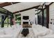 Bright and open living room with modern white furniture and large windows at 1616 W 116Th St, Carmel, IN 46032