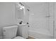 Clean bathroom features white subway tile, and modern fixtures at 1730 S State Ave, Indianapolis, IN 46203