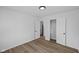 Clean, bright bedroom featuring hardwood floors and closet at 1730 S State Ave, Indianapolis, IN 46203