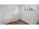 Neat entrance offers laminate floors, natural light and white trim at 1730 S State Ave, Indianapolis, IN 46203