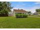 Charming single-story house featuring a well-manicured lawn and inviting curb appeal at 1730 S State Ave, Indianapolis, IN 46203