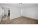 Hardwood floors connect the living room to the updated kitchen at 1730 S State Ave, Indianapolis, IN 46203
