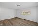 Neutral living area with hardwood floors, fresh paint, and natural light at 1730 S State Ave, Indianapolis, IN 46203