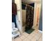 Bathroom showcasing a walk-in shower, toilet with toddler step stool and fun wall decor at 174 Jordan Dr, Franklin, IN 46131