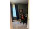 This bedroom is set up as a home office space and features a black desk and neutral carpeting at 174 Jordan Dr, Franklin, IN 46131