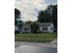 Charming single story home featuring tidy landscaping, dark shutters and a well-manicured lawn at 174 Jordan Dr, Franklin, IN 46131