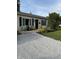 Inviting home exterior featuring a cozy front porch with seating and a nicely landscaped yard at 174 Jordan Dr, Franklin, IN 46131