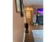 Hallway with wood-look flooring and decorative walls leads to living spaces at 174 Jordan Dr, Franklin, IN 46131