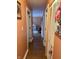 Hallway features wood-look floors that connects the living spaces in the home at 174 Jordan Dr, Franklin, IN 46131