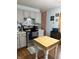 Kitchen featuring stainless steel oven, gray cabinets, tiled backsplash, butcher block island and stylish decor at 174 Jordan Dr, Franklin, IN 46131