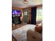 Comfortable living room with a large window, wood-look flooring, and an accent wall at 174 Jordan Dr, Franklin, IN 46131