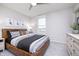 Cozy bedroom featuring a ceiling fan, large window, bed, and stylish furnishings at 18980 Seaforth Way, Westfield, IN 46074