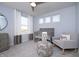 Charming Bedroom with soft natural light, a crib and comfortable rocking chair at 18980 Seaforth Way, Westfield, IN 46074