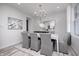Formal dining room with elegant chandelier and neutral decor at 18980 Seaforth Way, Westfield, IN 46074
