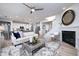 Spacious living room with fireplace, open to the kitchen and dining area at 18980 Seaforth Way, Westfield, IN 46074