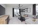 Cozy living room with comfortable seating, a stylish entertainment center, and a charming breakfast nook, perfect for relaxing and socializing at 18980 Seaforth Way, Westfield, IN 46074