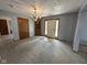 Open dining room area with a chandelier and neutral décor at 1902 Westview Dr, Indianapolis, IN 46221