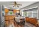 Eat-in kitchen with wood cabinets, stainless appliances, and large windows bringing in natural light at 1927 N Cherry St, Columbus, IN 47201