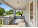Cozy front porch with a table and chairs, offering a relaxing outdoor seating area at 1927 N Cherry St, Columbus, IN 47201