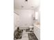 Bathroom featuring tub with shower, white vanity, toilet, and wood-look floor at 218 Narcissus Dr, Indianapolis, IN 46227