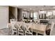 Spacious dining room with seating for eight, connecting to the kitchen and living area, ideal for entertaining at 218 Narcissus Dr, Indianapolis, IN 46227