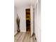 Entryway with wood-look floors, a decorative vase and an open door into another room at 218 Narcissus Dr, Indianapolis, IN 46227