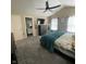 Cozy bedroom features vaulted ceilings, carpeted floors, and ensuite bathroom at 2485 Blue Ridge Dr, Greenwood, IN 46143
