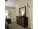 Bedroom with dresser and carpet, bedside table, and decorative ivy at 2485 Blue Ridge Dr, Greenwood, IN 46143