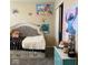 Bright bedroom featuring a bed, fun artwork, and decor at 2485 Blue Ridge Dr, Greenwood, IN 46143