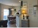 Charming dining area with hardwood floors and natural light, adjacent to the living room at 2485 Blue Ridge Dr, Greenwood, IN 46143