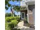 Charming front entrance with brick facade, American flag, and well-manicured landscaping at 2485 Blue Ridge Dr, Greenwood, IN 46143