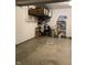 View of a garage with overhead shelving, storage and access to inside at 2485 Blue Ridge Dr, Greenwood, IN 46143