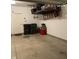 View of a garage with a storage rack, bins, and an access door to the house at 2485 Blue Ridge Dr, Greenwood, IN 46143