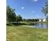 Community pond surrounded by lush green spaces at 2485 Blue Ridge Dr, Greenwood, IN 46143