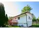 A charming home featuring an elevated deck and manicured landscaping at 2606 Shakespeare Dr, Southport, IN 46227