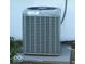 Exterior close-up of a modern HVAC unit providing climate control for the home at 2606 Shakespeare Dr, Southport, IN 46227