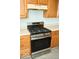 Stainless steel oven with upper and lower cabinets, and light countertops in a modern kitchen at 2606 Shakespeare Dr, Southport, IN 46227