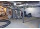 Unfinished basement featuring ductwork, furnace, and storage space at 2650 S Meridian St, Indianapolis, IN 46225
