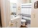 Clean and tidy bathroom with stylish striped shower curtain at 2650 S Meridian St, Indianapolis, IN 46225