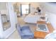 Bright bedroom featuring a desk and chair, and a comfy bed at 2650 S Meridian St, Indianapolis, IN 46225