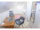 Bright bedroom featuring a desk and chair, and an ensuite bathroom at 2650 S Meridian St, Indianapolis, IN 46225