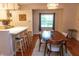 Cozy dining area with modern lighting and a view of the outdoor scenery at 2650 S Meridian St, Indianapolis, IN 46225