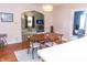 Dining room with a modern table and chairs, adjacent to the living room at 2650 S Meridian St, Indianapolis, IN 46225